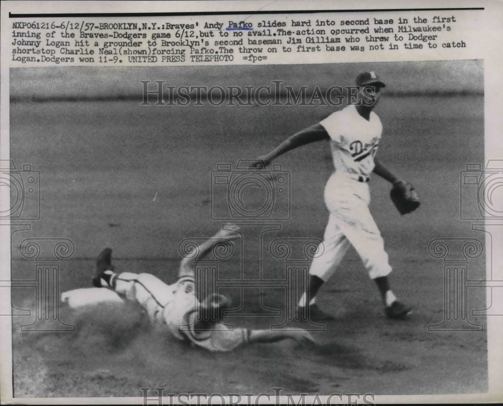 1957 Press Photo Braves&#39; Andy Pafko slides hard into 2nd base in the 1st inning - Historic Images