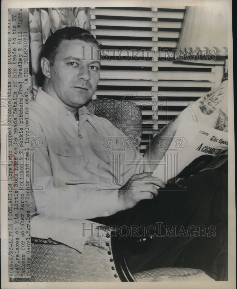 1948 Press Photo Ed Lopat Reads of His Trade From White Sox to Yankees - Historic Images