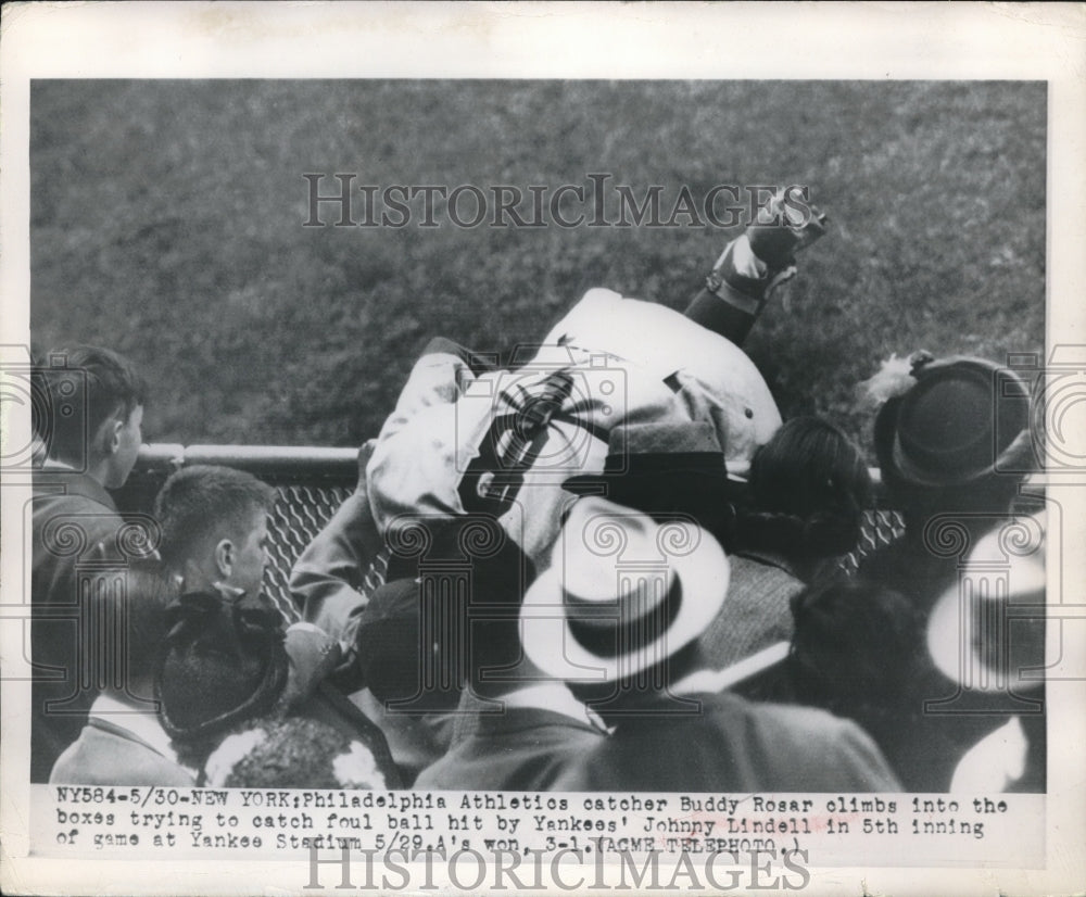 1949 Press Photo Philadelphia Athletics Catcher Buddy Rosar Goes for Catch in NY - Historic Images