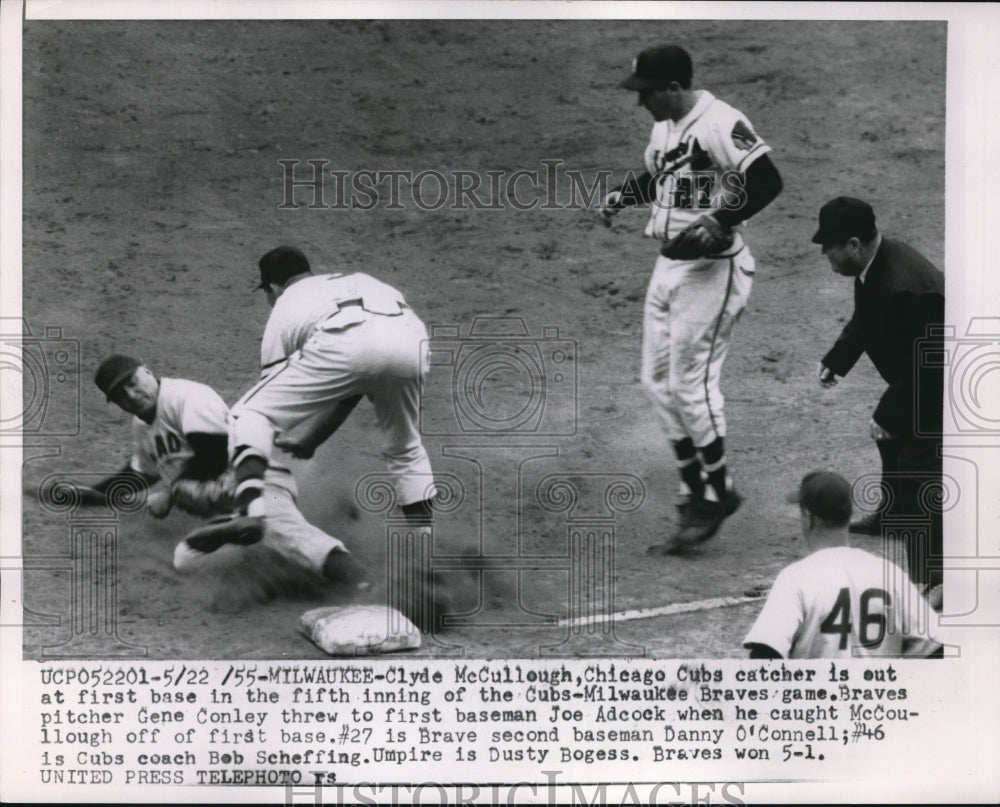 1955 Press Photo Milwaukee Cubs C McCullough out at 1st vs Braves J Adcock - Historic Images