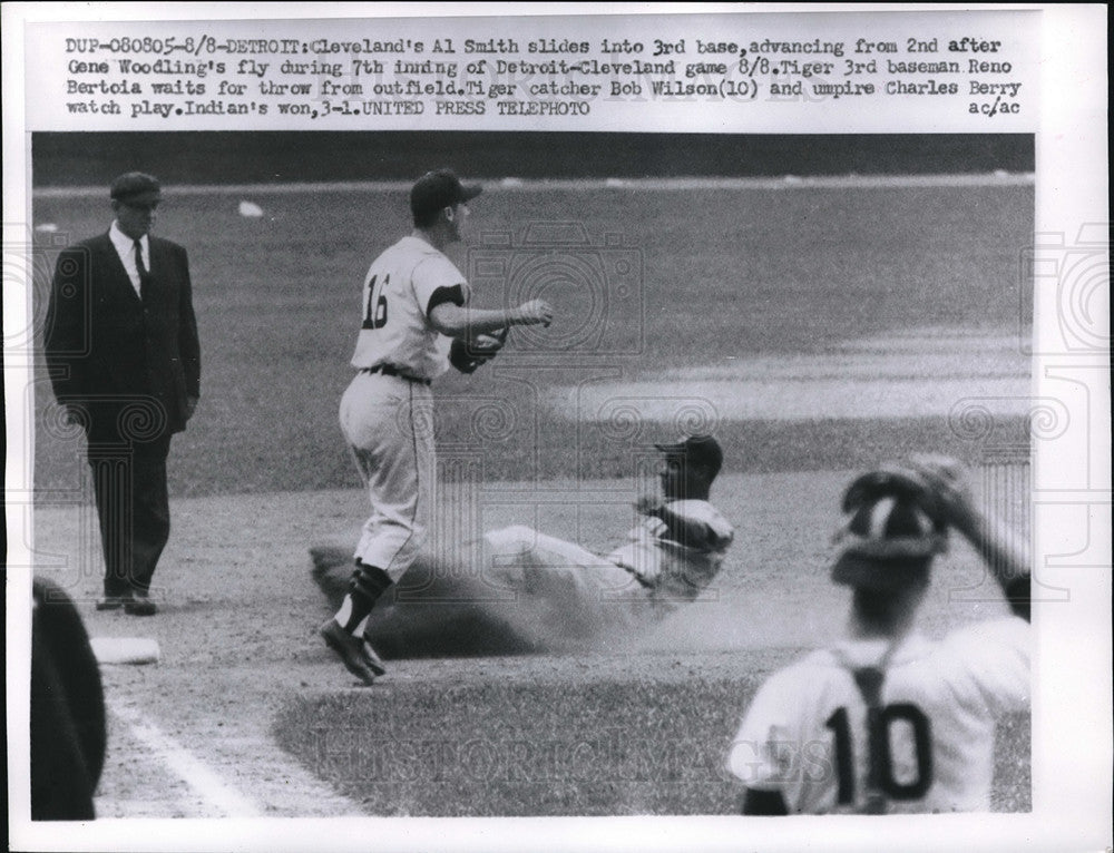 1957 Press Photo Cleveland's Al Smith slides to 3rd base vs Tigers Reno Bertoia - Historic Images