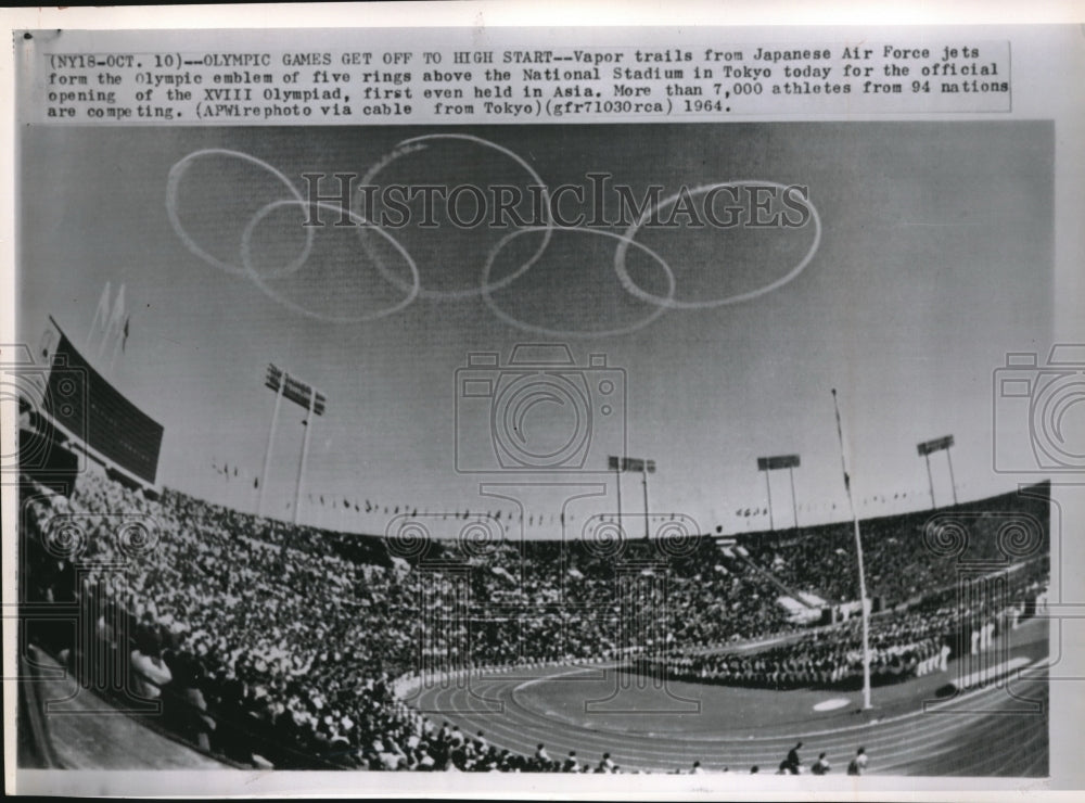 1964 Press Photo Japanese Air Force Jets Form Olympic Emblem Over Tokyo Stadium - Historic Images