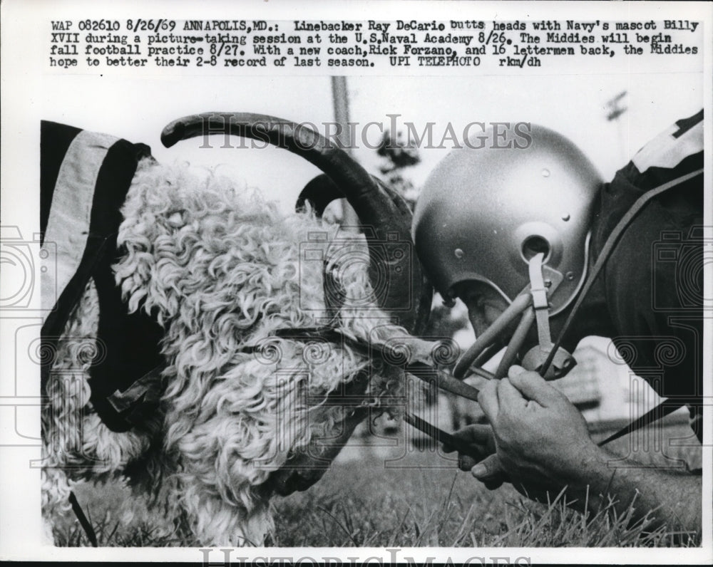 1968 Press Photo Linebacker Ray DeCarie butts head with Navy mascot Billy XVII - Historic Images