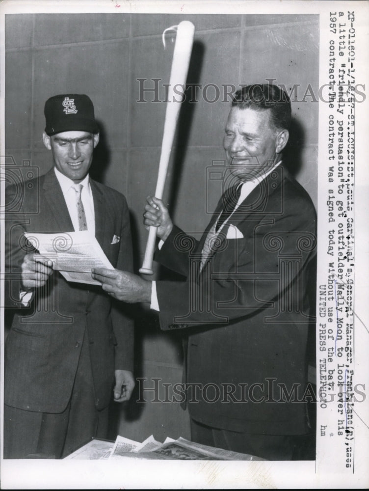 1957 Press Photo Cardinals General Manager Frank Lane Looks Over New Contract - Historic Images