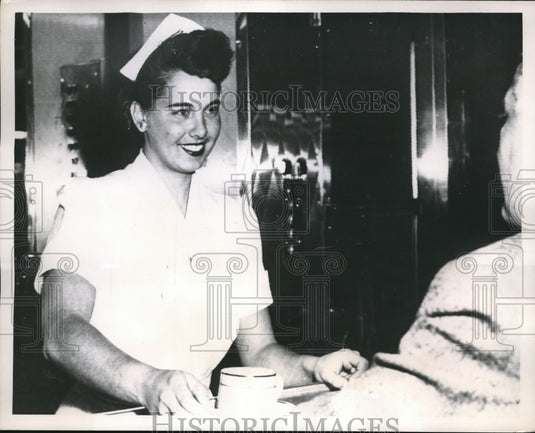 1952 Press Photo Katy Rodolph serves cup of coffee at casino. - nes11926 - Historic Images