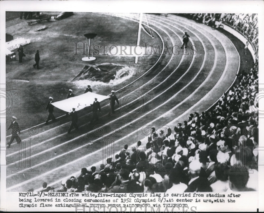 1952 Press Photo Olympic Flag Carried from Stadium Closing Ceremony Finland - Historic Images