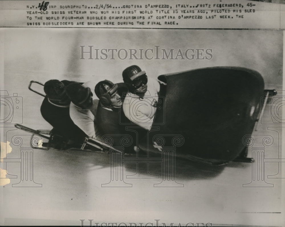 1954 Press Photo Fritz Feierabend Pilots Bobsledders to 4-Man Championship - Historic Images