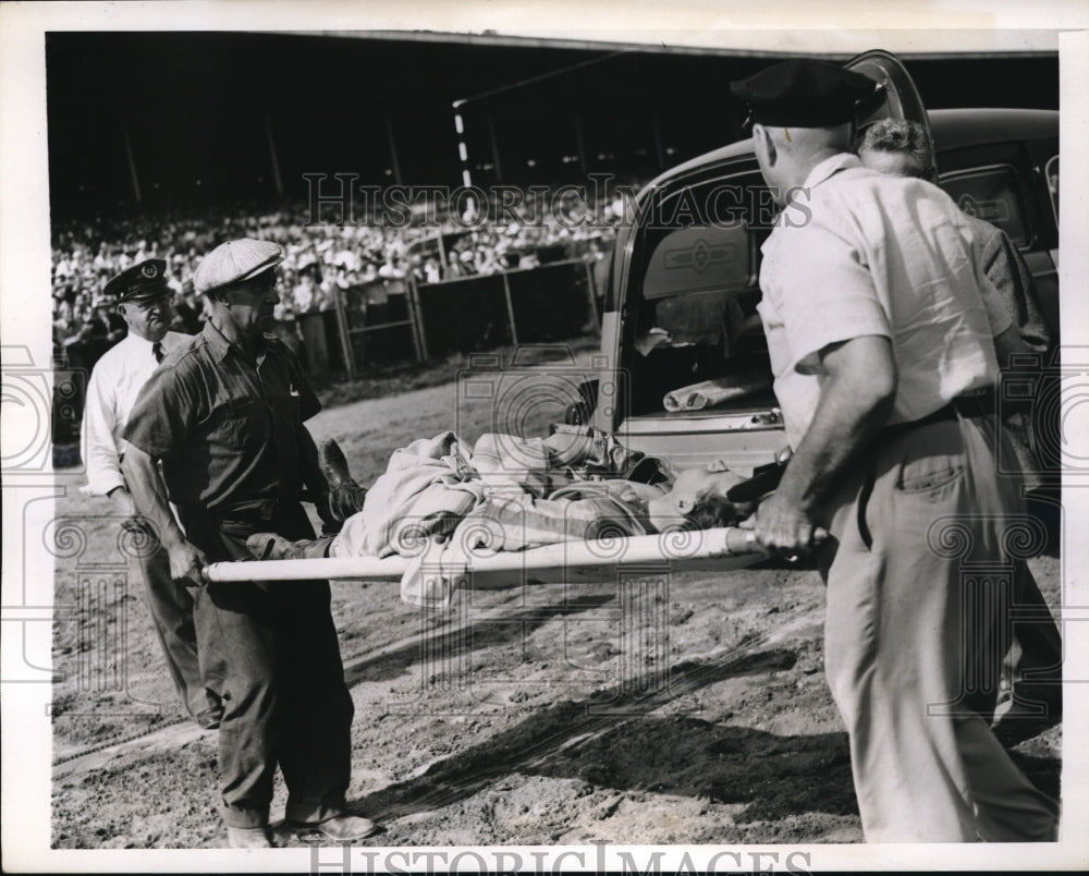 1943 Press Photo Johnny Longden carried to ambulance. - nes13292 - Historic Images