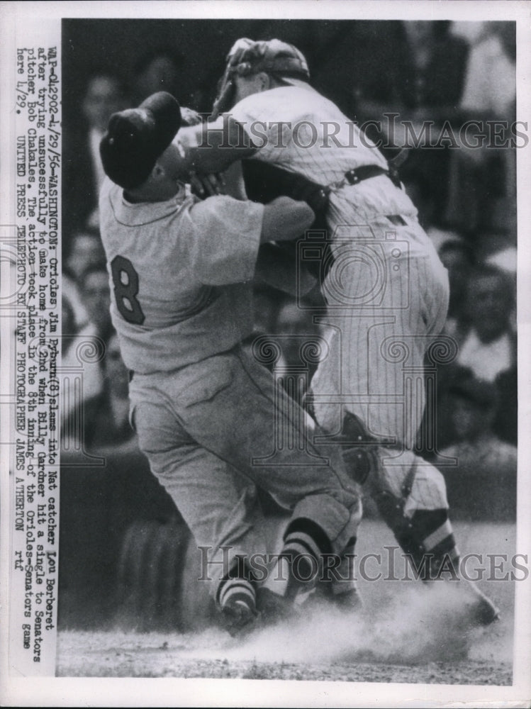 1956 Press Photo Baltimore Oriole Jim Pyburn Collides with Catcher Lou Berberet - Historic Images