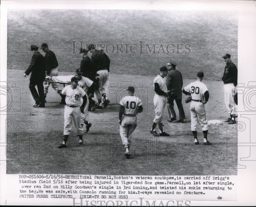 1956 Press Photo Boston southpaw Mel Parnell is injured running to second and - Historic Images