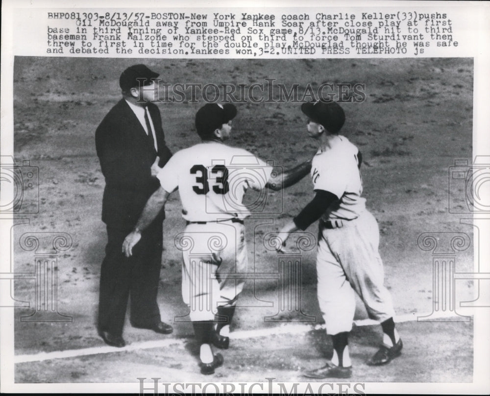 1957 Press Photo NY coach Charlie Keller pushes Gil McDougald away after a play - Historic Images