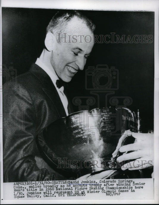 1960 Press Photo David Jenkins accepts trophy for winning seniors men title. - Historic Images