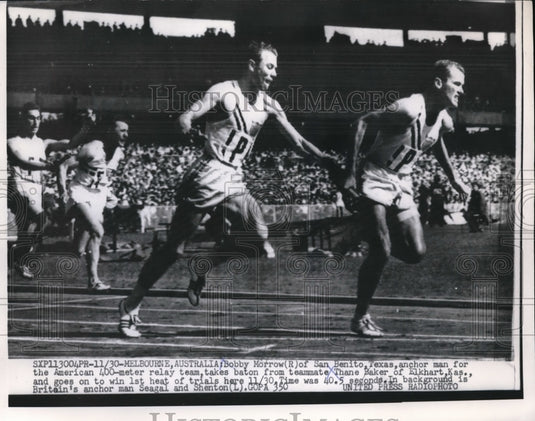 1956 Press Photo Bobby Morrow of Texas takes Baton to teammate Thane Baker. - Historic Images