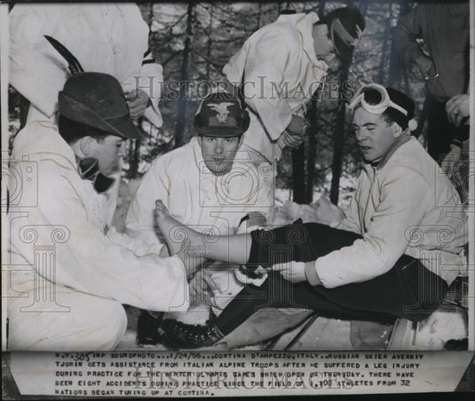 1956 Press Photo Russian skier Averkiy Tjurin & Italian ski patrol - nes17811 - Historic Images