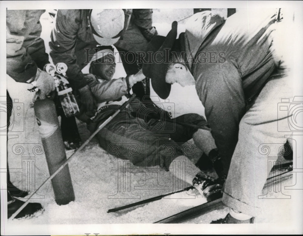 1960 Press Photo Skier Kazu Sato  collapses at finish of Olympic race - Historic Images