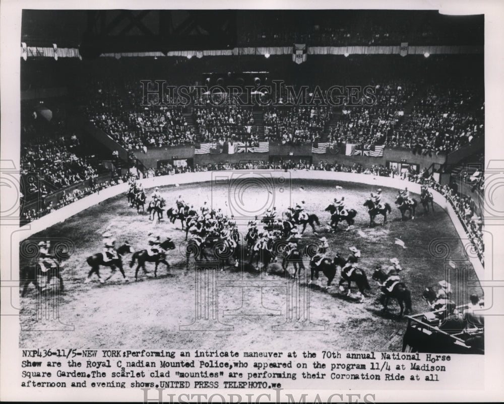 1953 Press Photo Royal Canadian Mounted Police perform at National Horse Show - Historic Images