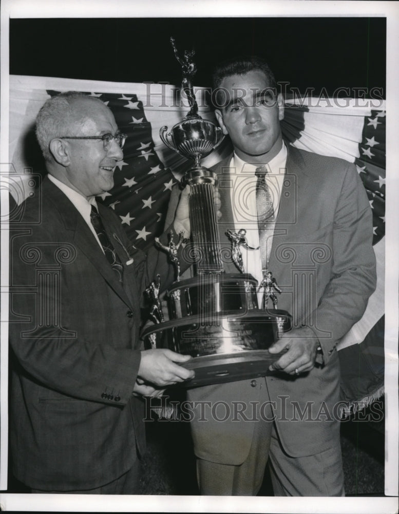 1957 Press Photo Chicago sportswriter Leo Fisher &amp; MVP award to Bob Pellerini - Historic Images