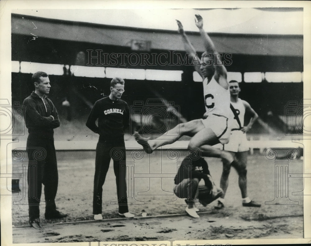 1934 Press Photo Hank Godshall in broad jump at Oxford - nes21625 - Historic Images