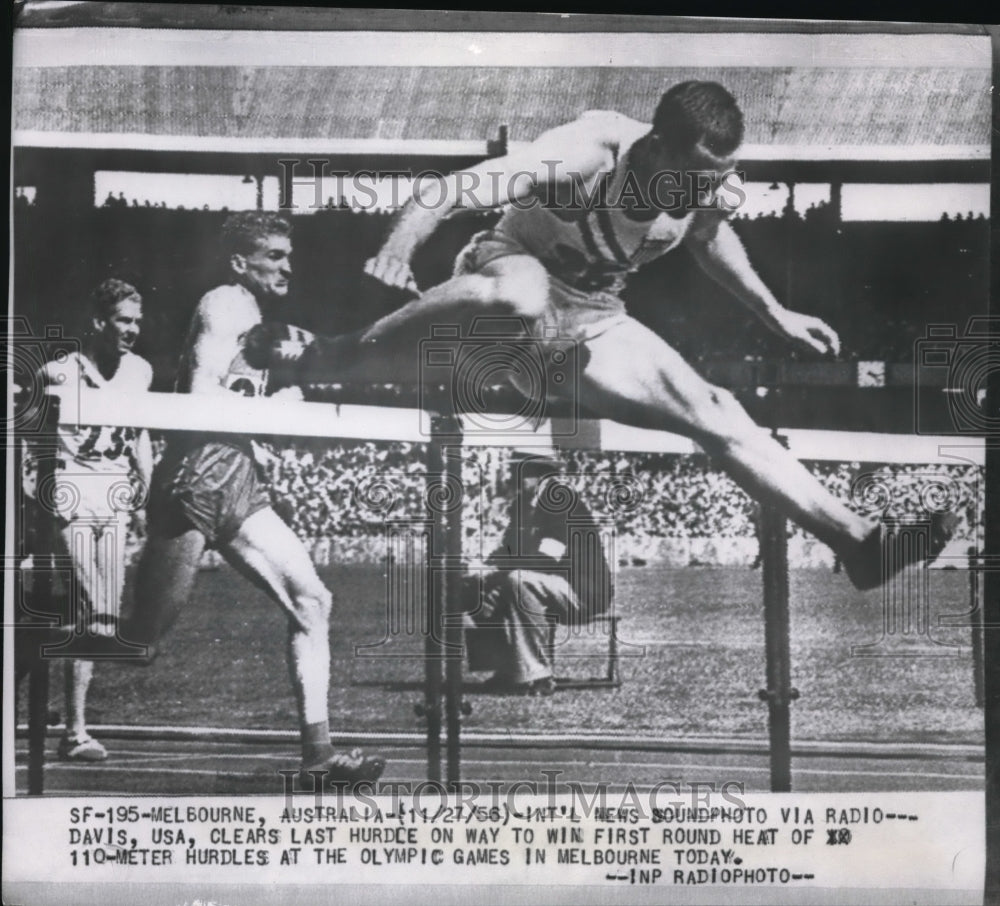 1966 Press Photo Davis clears last hurdle in 110 m at Olympics in Melbourne - Historic Images