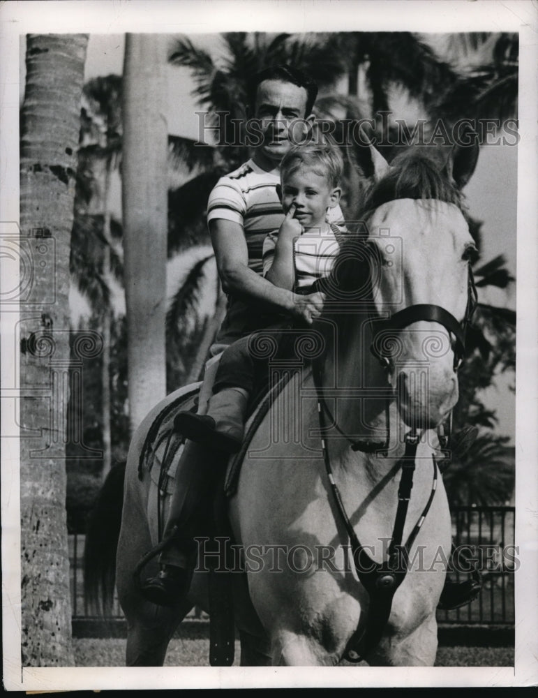 1948 Press Photo Miami Fla Jockey Ted Atkinson &amp; son John out for a ride - Historic Images