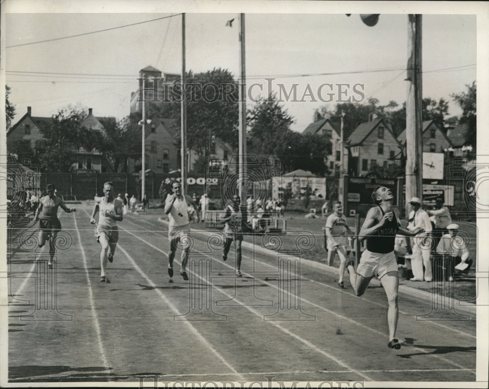 1934 Press Photo NAAU track meet Ivan Fuqua of Ind U in 400 meter, H Green- Historic Images