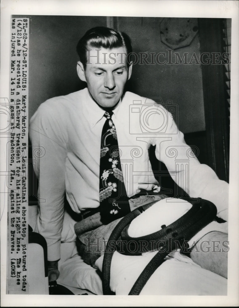 1950 Press Photo Marty Marion St Louis Cardinal shortstop &amp; diathermy treatment - Historic Images