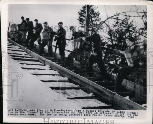 1950 Press Photo Workmen add snow to ski run at Lake Placid NY - nes43560 - Historic Images