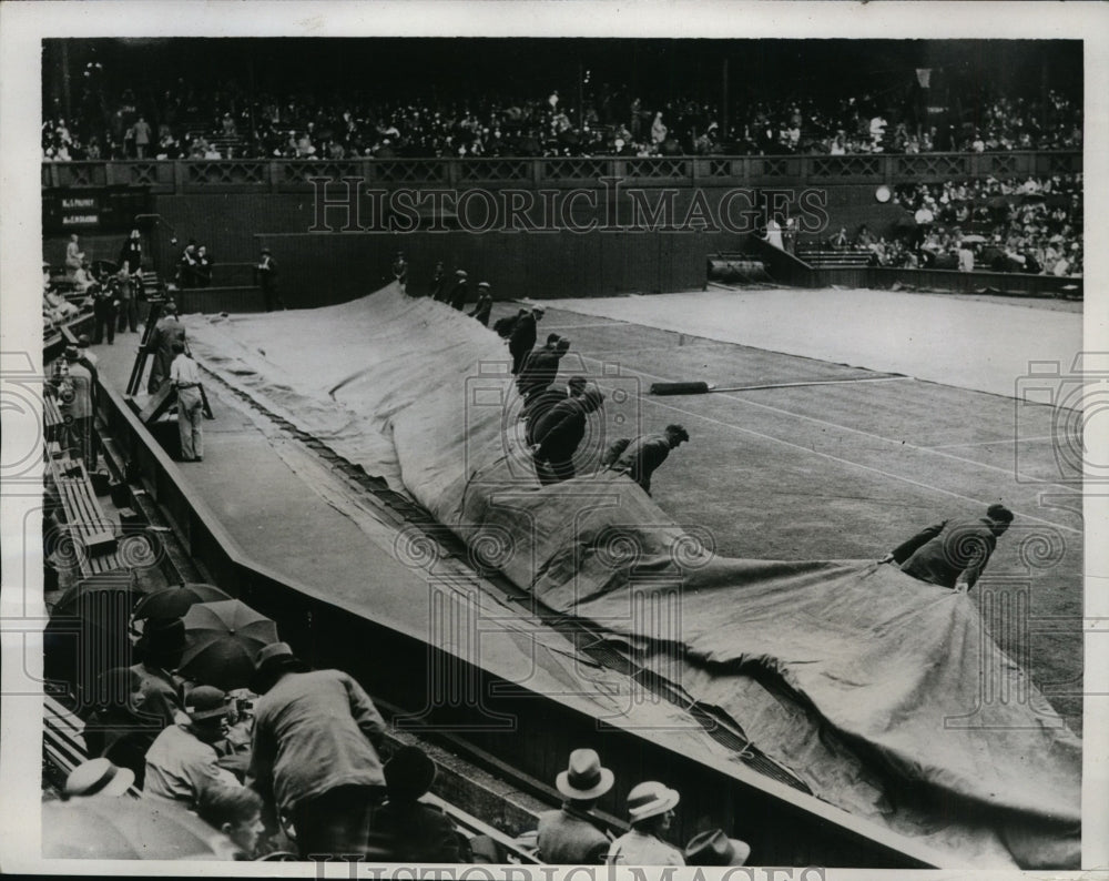 1934 Press Photo Rain halts English tennis championship at Wimbledon - nes43875- Historic Images