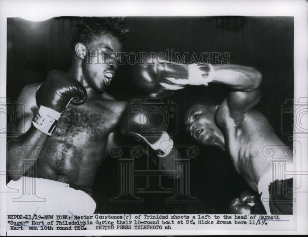 1956 Press Photo Hector Constance vs Garnett Sugar Hart in NYC bout - nes49361- Historic Images