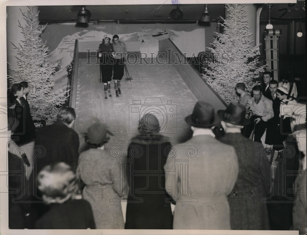 1936 Press Photo Christian Djehmakian, Merle Smith ski slide at Marshal Field Co- Historic Images