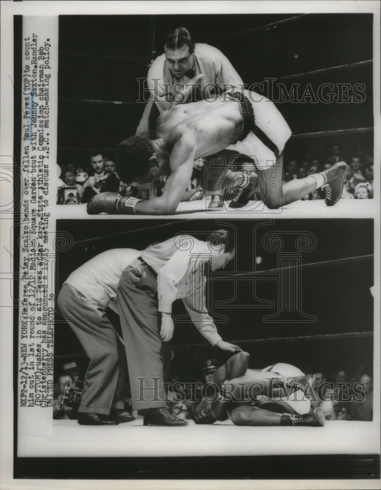 1952 Press Photo Petey Scalzo counts out boxer Raul Perez against Johnny Saxton - Historic Images