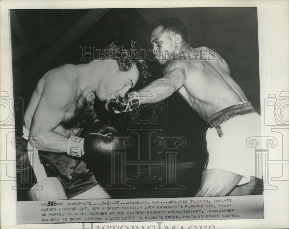 1953 Press Photo Cuban lightweight boxer Orlando Zulueta beats Paddy De Marco - Historic Images