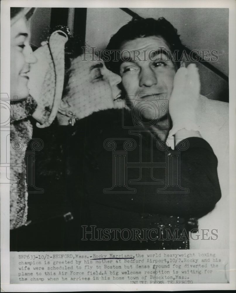 1952 Press Photo Rocky Marciano World Heavyweight Greeted by Mother at Airport - Historic Images