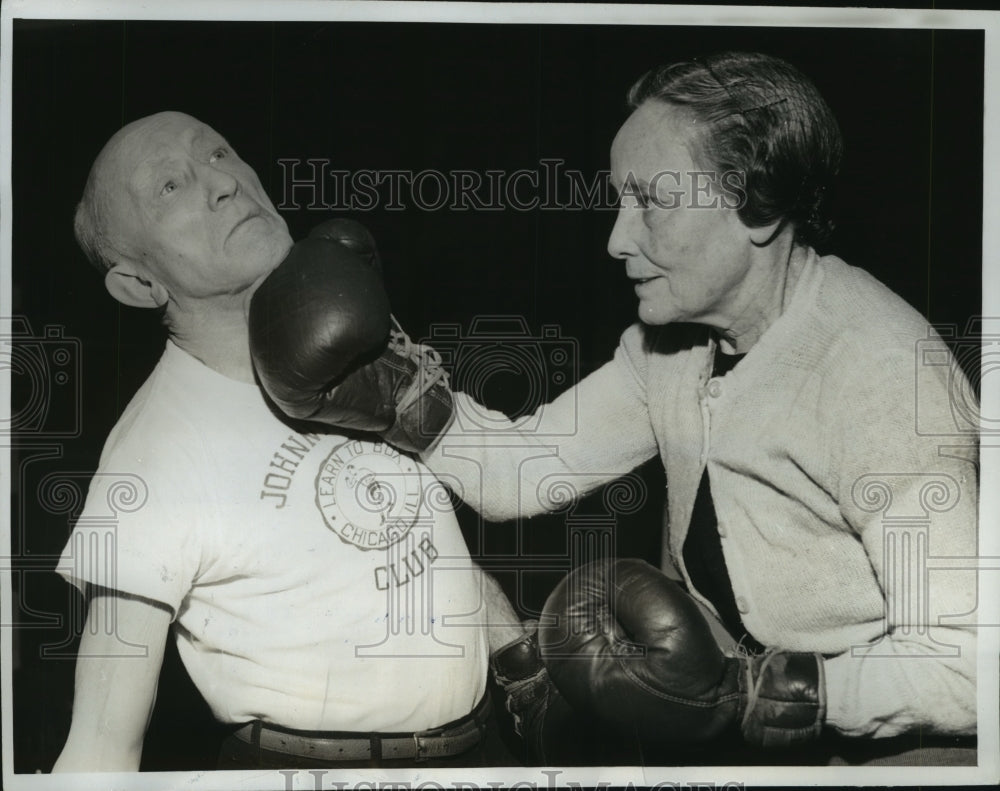 1962 Press Photo Johnny Coulon punched by wife Marie on his 73rd birthday- Historic Images