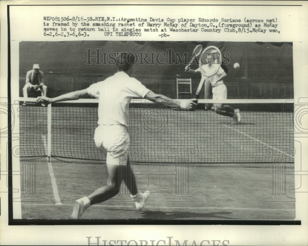 1958 Press Photo Argentine player Eduardo Soriano framed by smashing racket - Historic Images