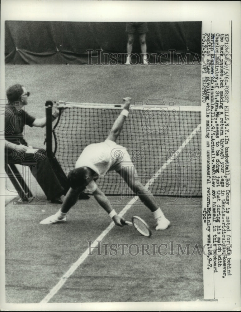 1960 Press Photo Charles McKinley makes a back pass at tennis match - nes55924- Historic Images