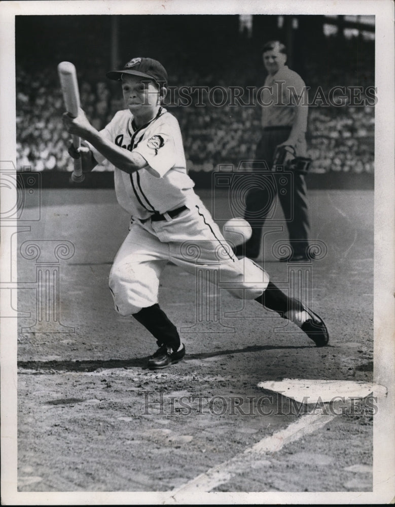 1957 Press Photo Young baseball player Ben Farrell misses a bunt while batting - Historic Images