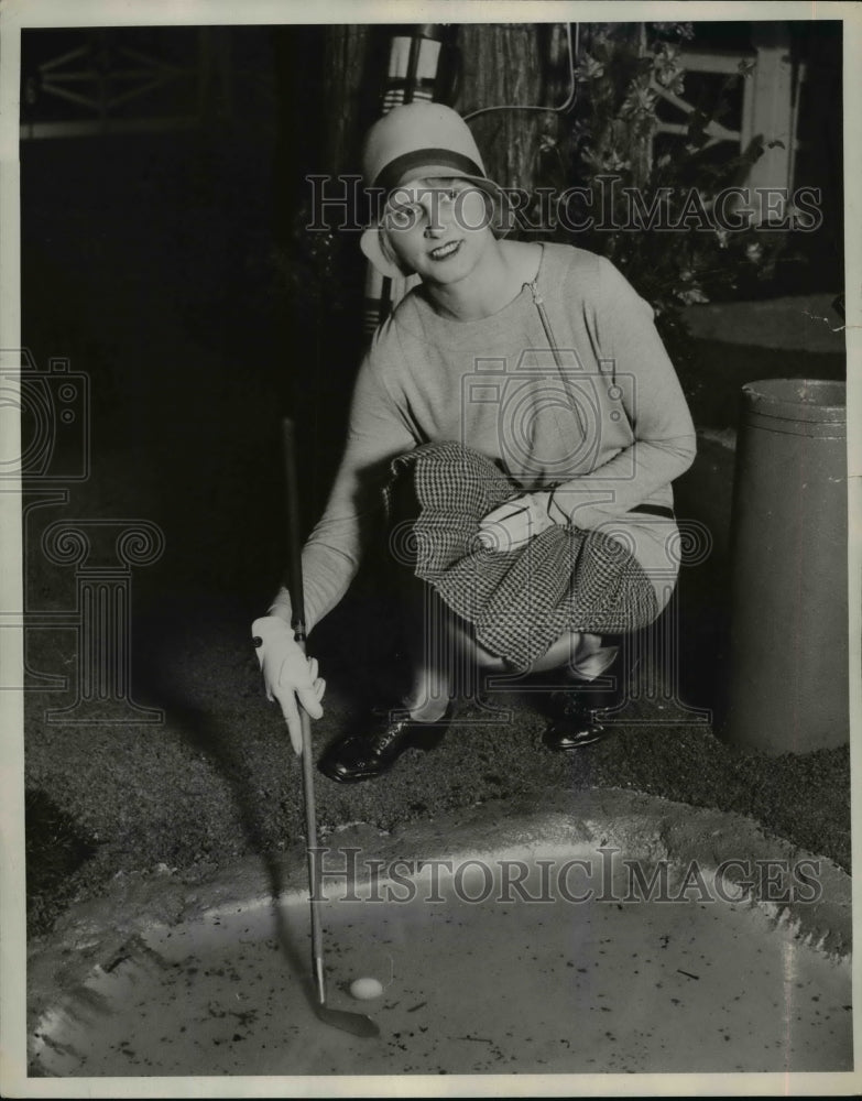 1929 Press Photo Joan Olson in golf costume next to a sand trap - net05686 - Historic Images