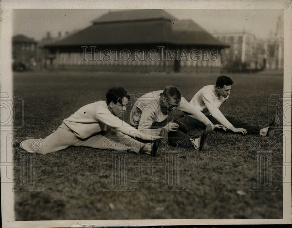 1929 Press Photo Harvard track athletes stretch their leg muscles - net07884- Historic Images