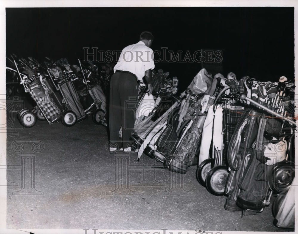 1957 Press Photo Golfer Harold Turk &amp; golf bags at a course - net10655 - Historic Images