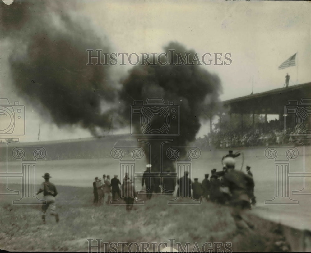 1930 Press Photo Auto racing car crash as car goes up in smoke - net15890- Historic Images