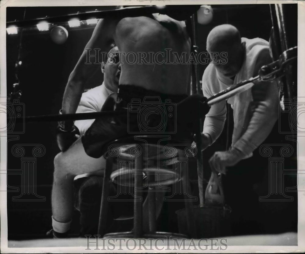 1951 Press Photo Rushmere tens to boxer whike Piazza gives advice at bout - Historic Images