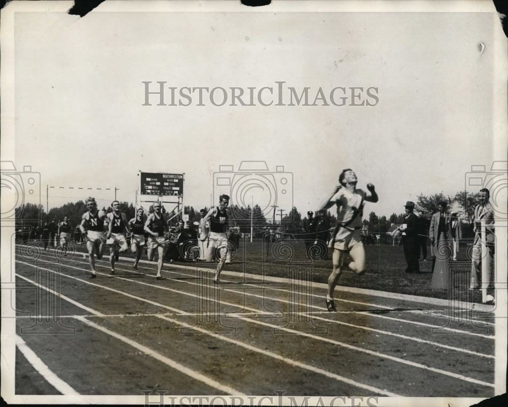 1931 Press Photo Russell of Michigan wins 440 yard vs Davidson & Hayne - Historic Images