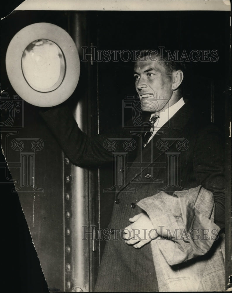 1925 Press Photo Boxer Gene Tunney arrives in a city by train - net25652 - Historic Images
