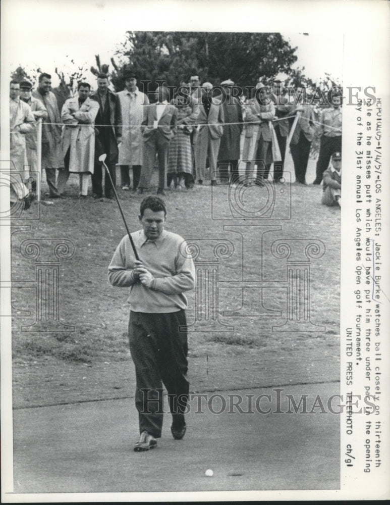 1957 Press Photo Jackie Burke watches ball closely on 13th hole - net35027 - Historic Images