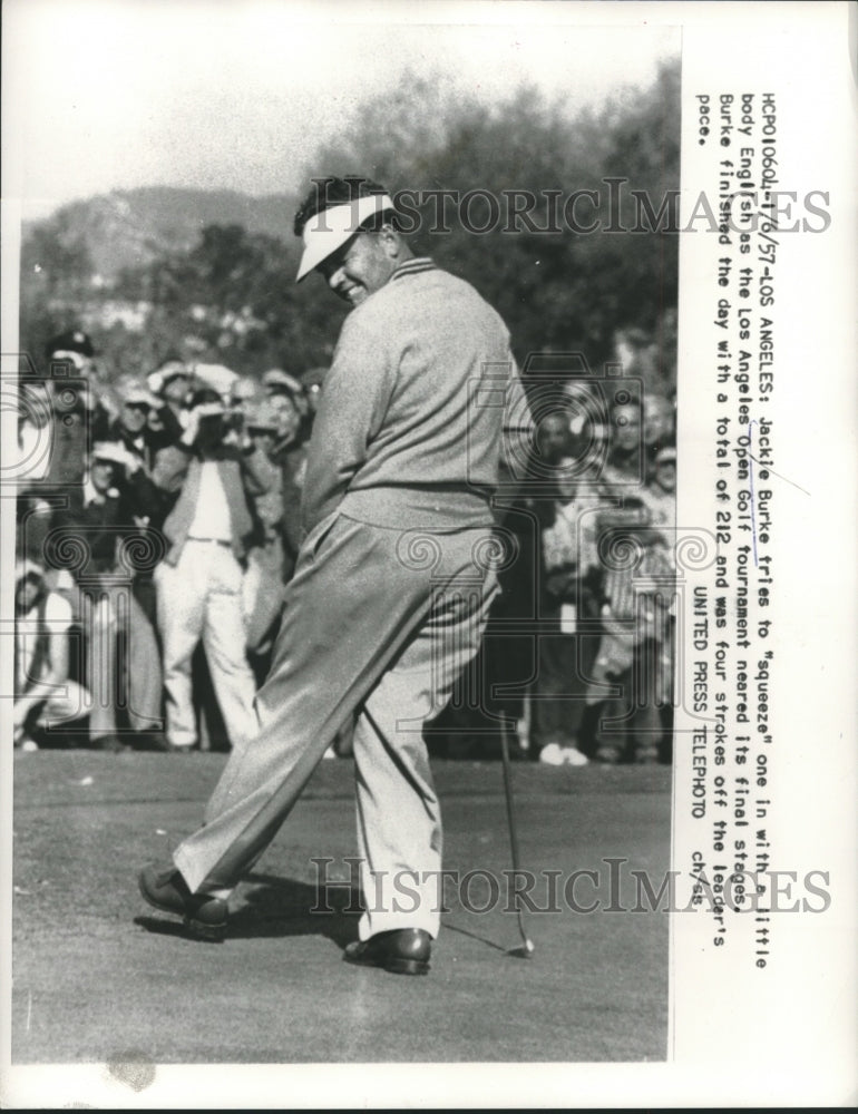 1957 Press Photo Jackie Burke tries to squeeze one in with body English - Historic Images