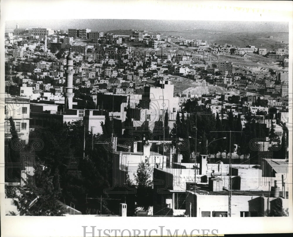 1970 Peace and Tranquility hover over Amman Jordan at Night. - Historic Images