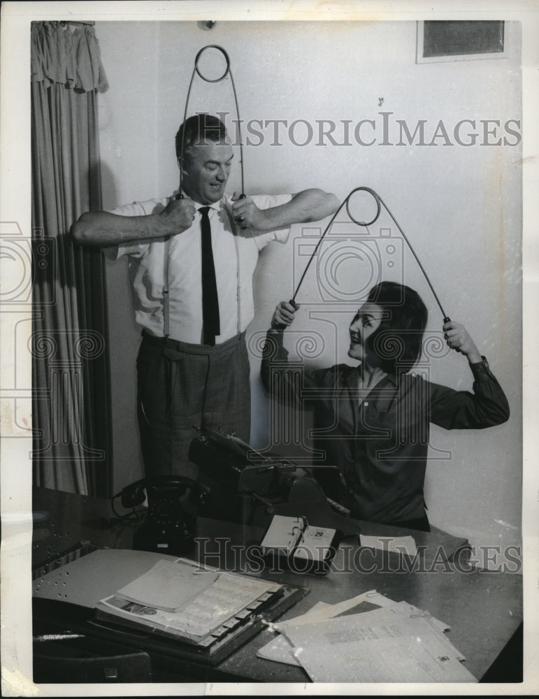 1962 Press Photo Office Workers Relieve Tension With Giant Safety Pins-Historic Images
