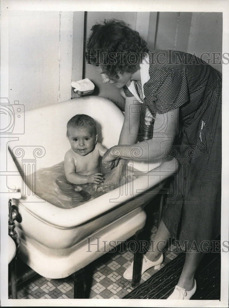 1939 Press Photo Cute Baby Gets Bath On Floating Hospital Ship - Historic Images