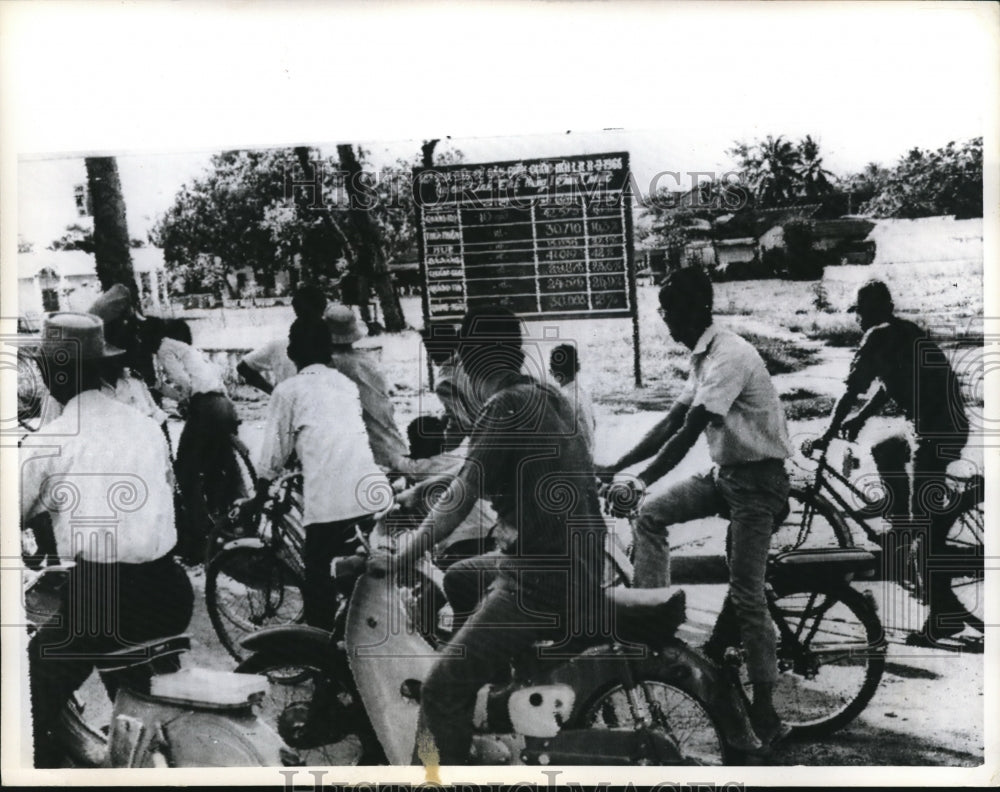 1966 Press Photo Vietnamese Men Await Election Results on Bicycles, Scooters - Historic Images